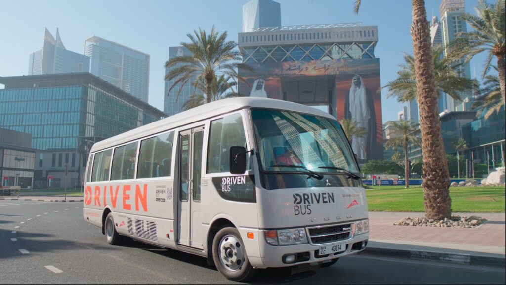 18 seater coaster bus providing car lift Dubai To Abu Dhabi services
